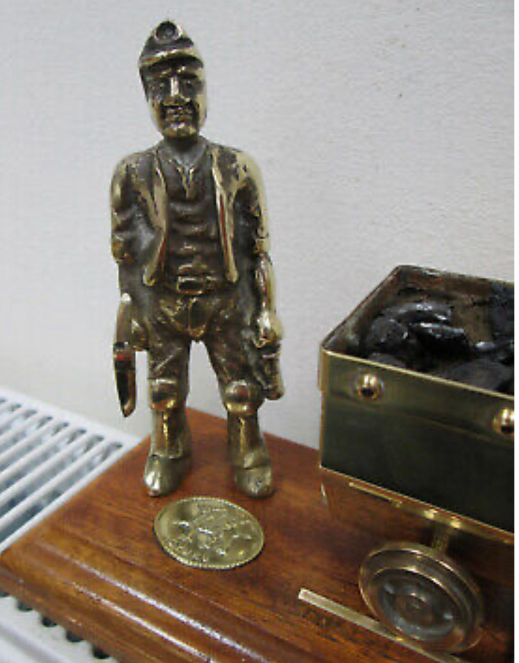 Welsh Miner in Brass with Coal Truck