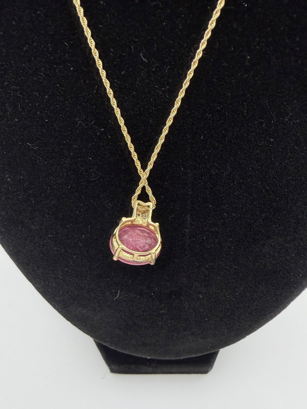 Necklace - 9ct Gold oval Ruby pendant