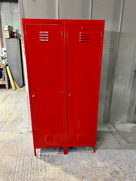 A Refurbished pair of joined Metal lockers finished in cherry apple red.