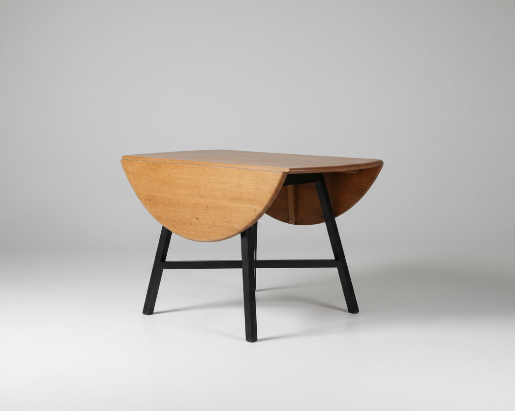 Ercol 383 circular drop leaf dining table